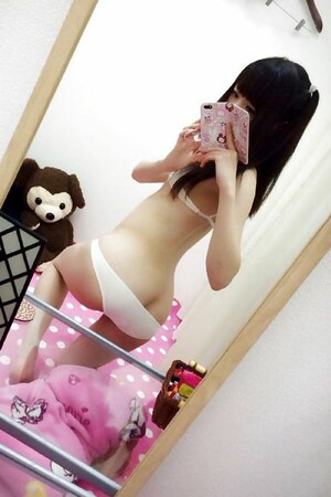 Thin oriental teenager from Tokyo,..