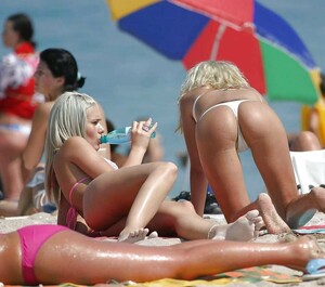 Nude beautiful girls on the beach. They